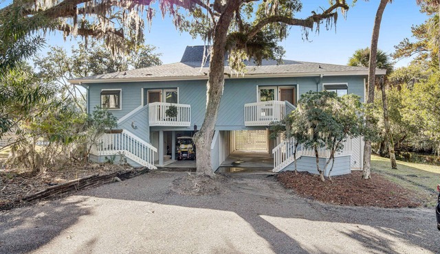 Dog-friendly beach home with screened porch, charming interior, & W/D