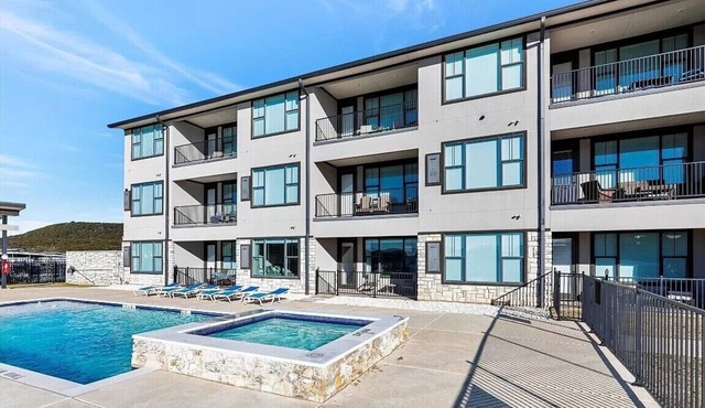 NEW! First Floor Pool side PK Lake Luxury Condo - Hot Tub, FirePit, Gym, Laundry in Graford