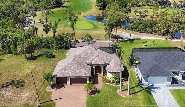 Peaceful Palms: 3 bedroom, 2 bath, heated pool, spacious lanai, golf course view