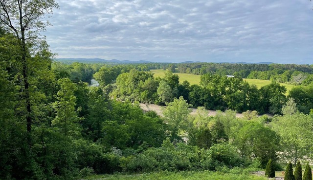 River Bluff offers luxurious living on the Caddo River, with scenic views.