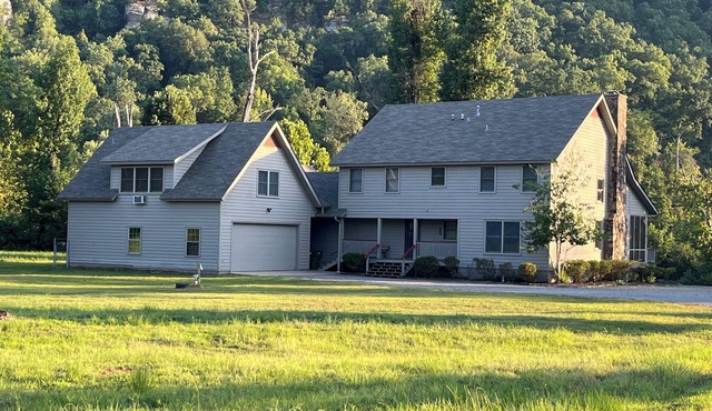 Spacious family home on the banks of the Little Red River in Heber Springs AR.