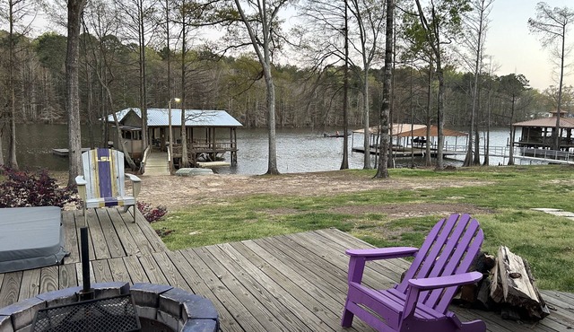 Waterfront house with boathouse, boat launch, outdoor kitchen, fire pit