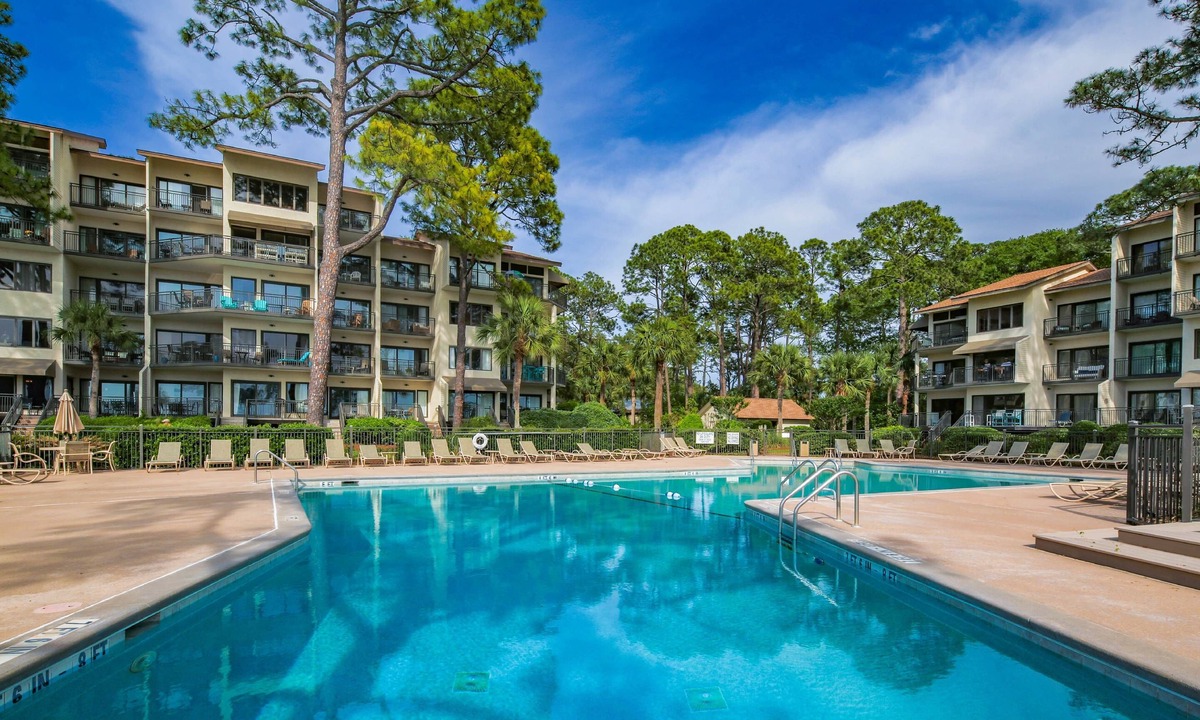 South Beach Condo | Updated & Gorgeous End Unit with Spectacular Views of Pool & Sound. South Beach Oasis Awaits you!