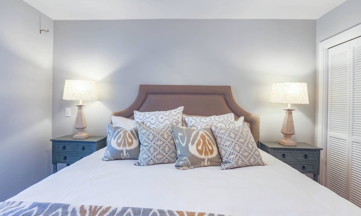 West Beach Condo | Enjoy Stunning River Views, Community Pool & Beautiful Furnishings, Dog Friendly. Walk to Beach!