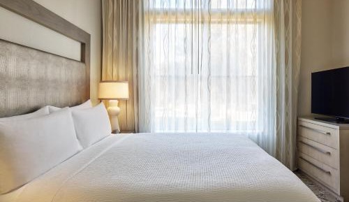 One-Bedroom King Suite with Sofa Bed and Roll-in Shower - Mobility and Hearing Accessible