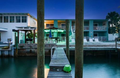 Bay Esplanade Apartment | Enchanted Inn Suite #3: Waterfront, Pool, Fishing Dock, Boat Docks & Tiki Bar!