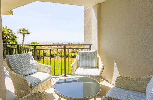 Isle of Palms Condo | Professionally Decorated Corner Condo with Ocean Views, Covered Balcony & Access to Community Pool
