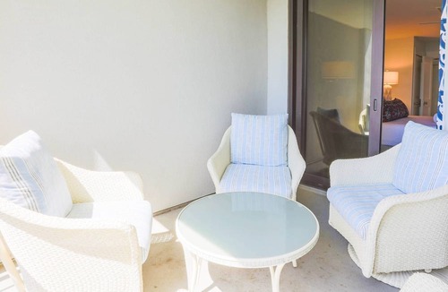 Isle of Palms Condo | Professionally Decorated Corner Condo with Ocean Views, Covered Balcony & Access to Community Pool