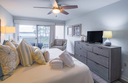 South Beach Condo | Updated & Gorgeous End Unit with Spectacular Views of Pool & Sound. South Beach Oasis Awaits you!