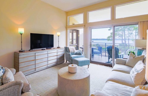 South Beach Condo | Updated & Gorgeous End Unit with Spectacular Views of Pool & Sound. South Beach Oasis Awaits you!