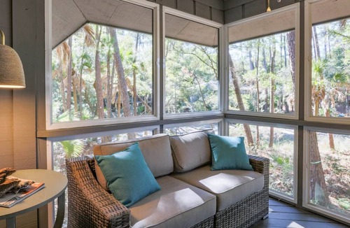 West Beach Condo | Enjoy Stunning River Views, Community Pool & Beautiful Furnishings, Dog Friendly. Walk to Beach!
