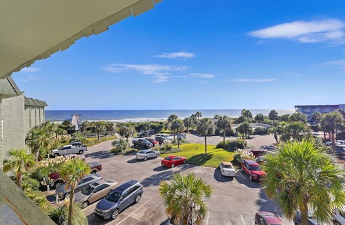 Isle of Palms Condo | Front beach sea cabin with amazing view, pool access, beach access, and pier!