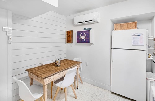 Folly Beach Apartment | TUCKED AWAY. 1/2 block from shops, restaurants and bars.1block to beach.
