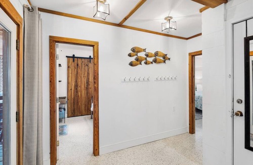 Folly Beach Apartment | TUCKED AWAY. 1/2 block from shops, restaurants and bars.1block to beach.