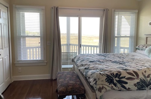 Charleston Apartment | Folly Beach Riverfront Apt with dock, private boat ramp kayaks and bikes