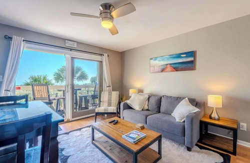 North Forest Beach Condo | Beachfront Condo at Coligny | Pool View + Balcony