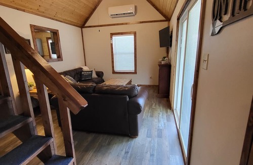Gilmer Cabin | Cozy Lakefront 2-bedroom cabin in tranquil Big Sandy, TX.