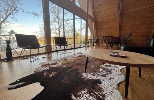 Dogwood Cabin | Modern lakefront cabin nestled in the piney woods of East Texas. Pet Friendly!